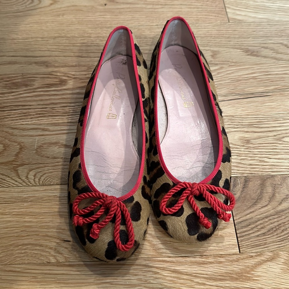 Pretty Ballerinas leopard print with red bow. Size 8.5